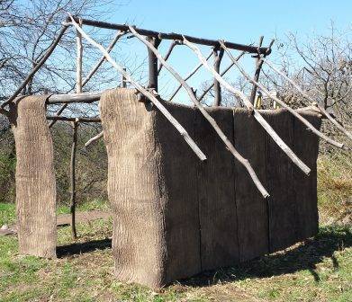 bark house under construction