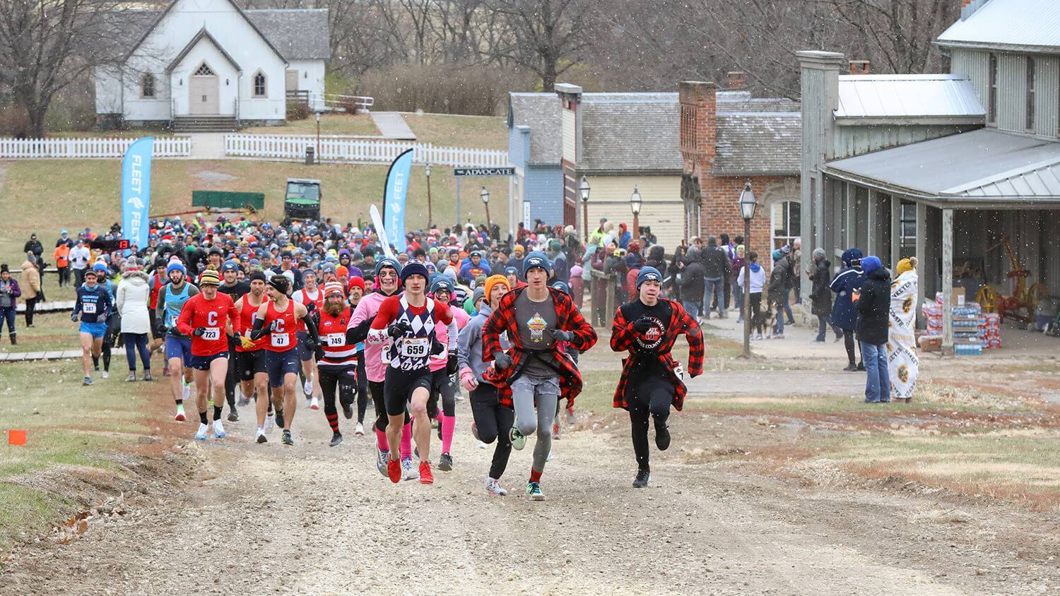 runners leaving start line in 1876 town of walnut hill